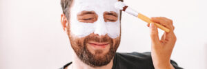 Man is enjoying facial mask at the Outcall Spa in Singapore.
