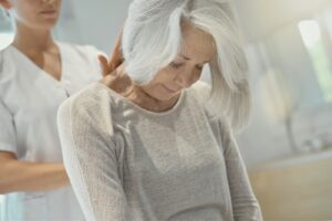 Silver generation, senior woman having geriatric massage